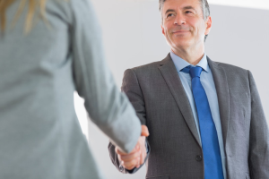 A handshake at the business meeting