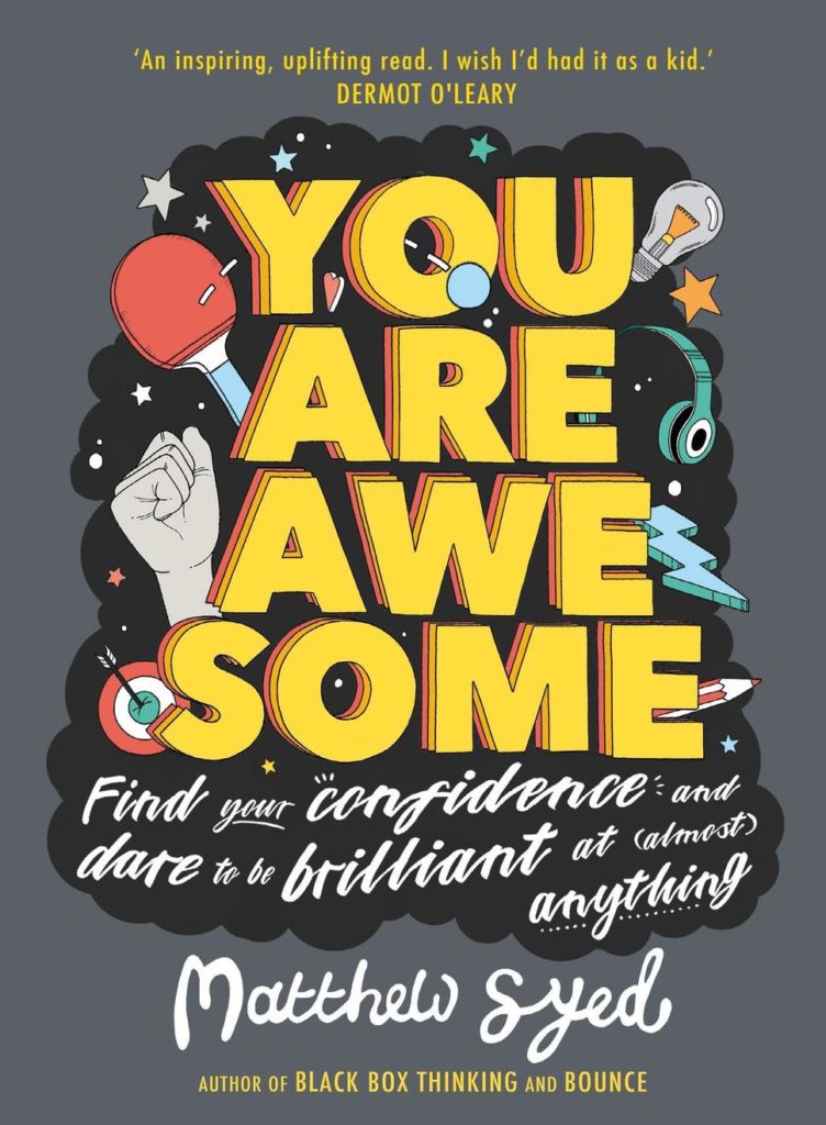This is a photo of a grey book cover with "you are awesome" printed in large yellow block letters. Underneath that it says "FInd your confidence and dare to be brilliant at (almost) anything." It is by Matthew Syed and behind the text are drawings of a fist, a ping png racket, a lightning bolt, light bulb, ear phones, and a target with an arrow in it.